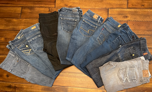Lot of 100 Pieces of Mens & Womens Jeans, Dress Shirts & Shorts. MANIFEST INCLUDED
