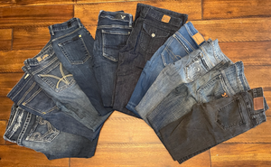 Lot of 100 Pieces of Mens & Womens Jeans, Dress Shirts & Shorts. MANIFEST INCLUDED